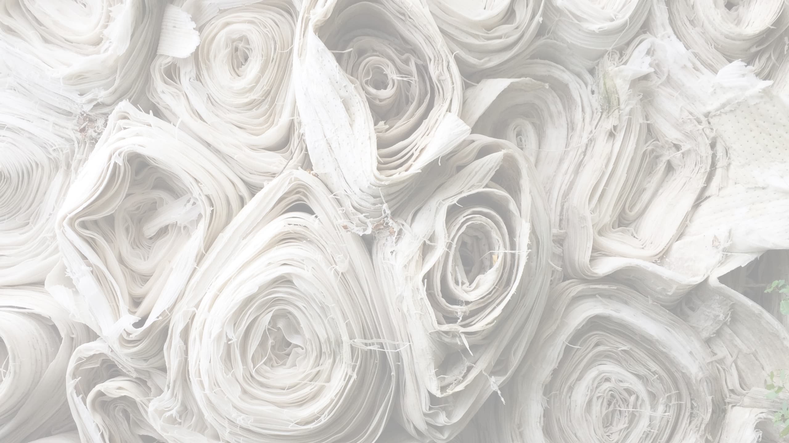 Rolos de Tecidos brancos no fundo